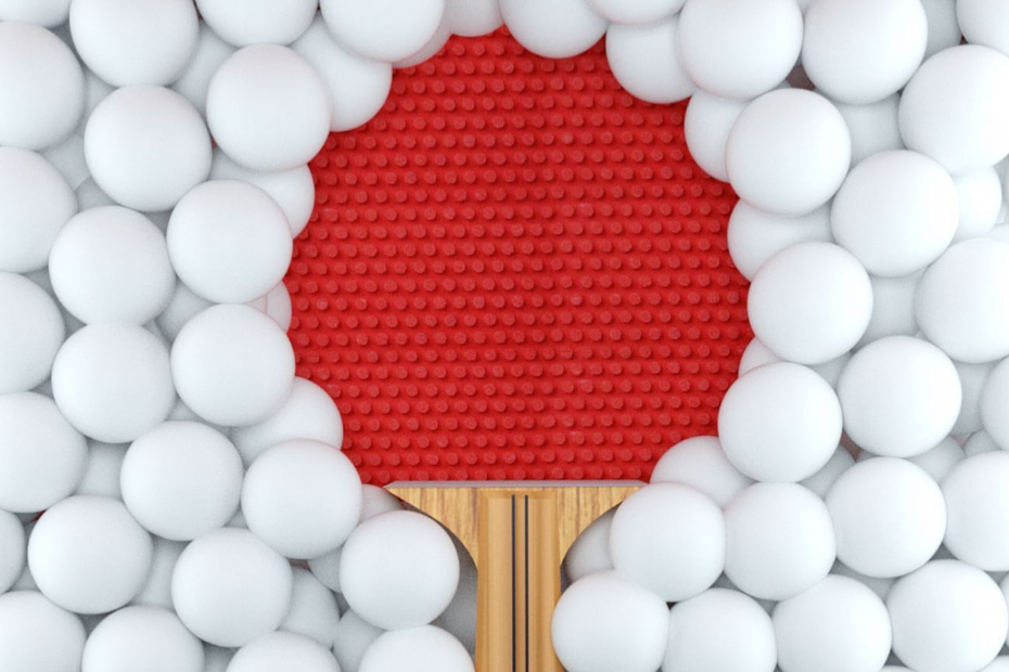 ping pong balls and paddle